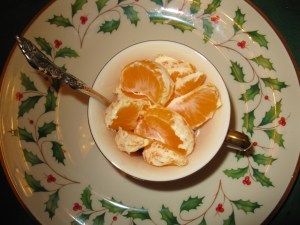 Greek yogurt with scruffy sections of clementine