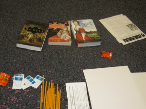Karleen Koen's novels plus other incentives on classroom floor. By Kathy Waller.